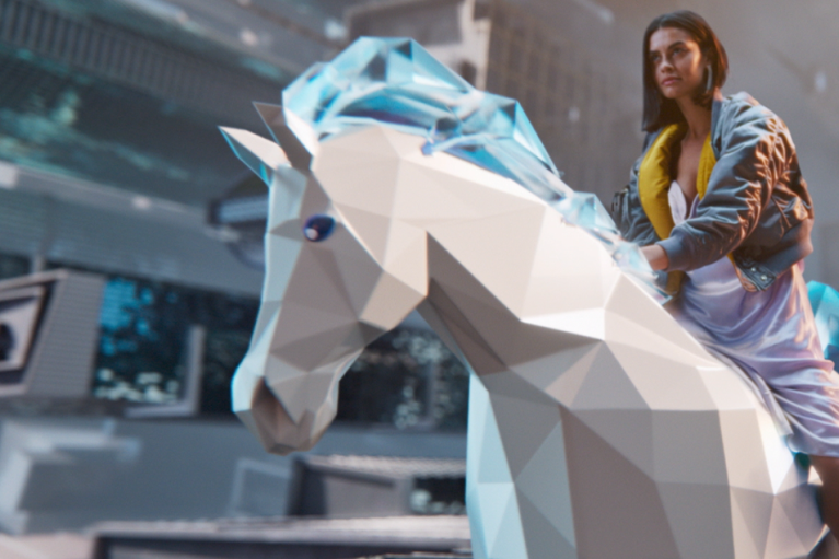 Fashion model sitting on a unicorn statue